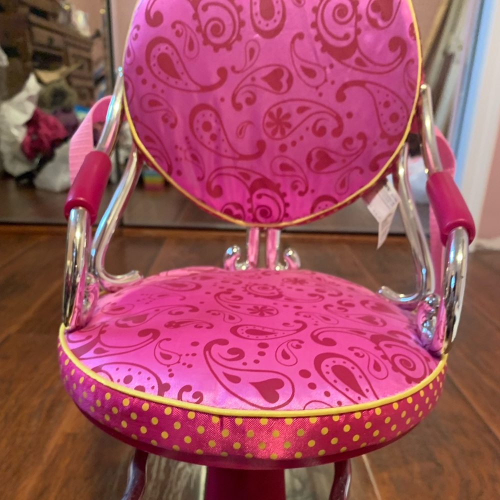 American girl doll chair along with Jo-Jo siwa watch